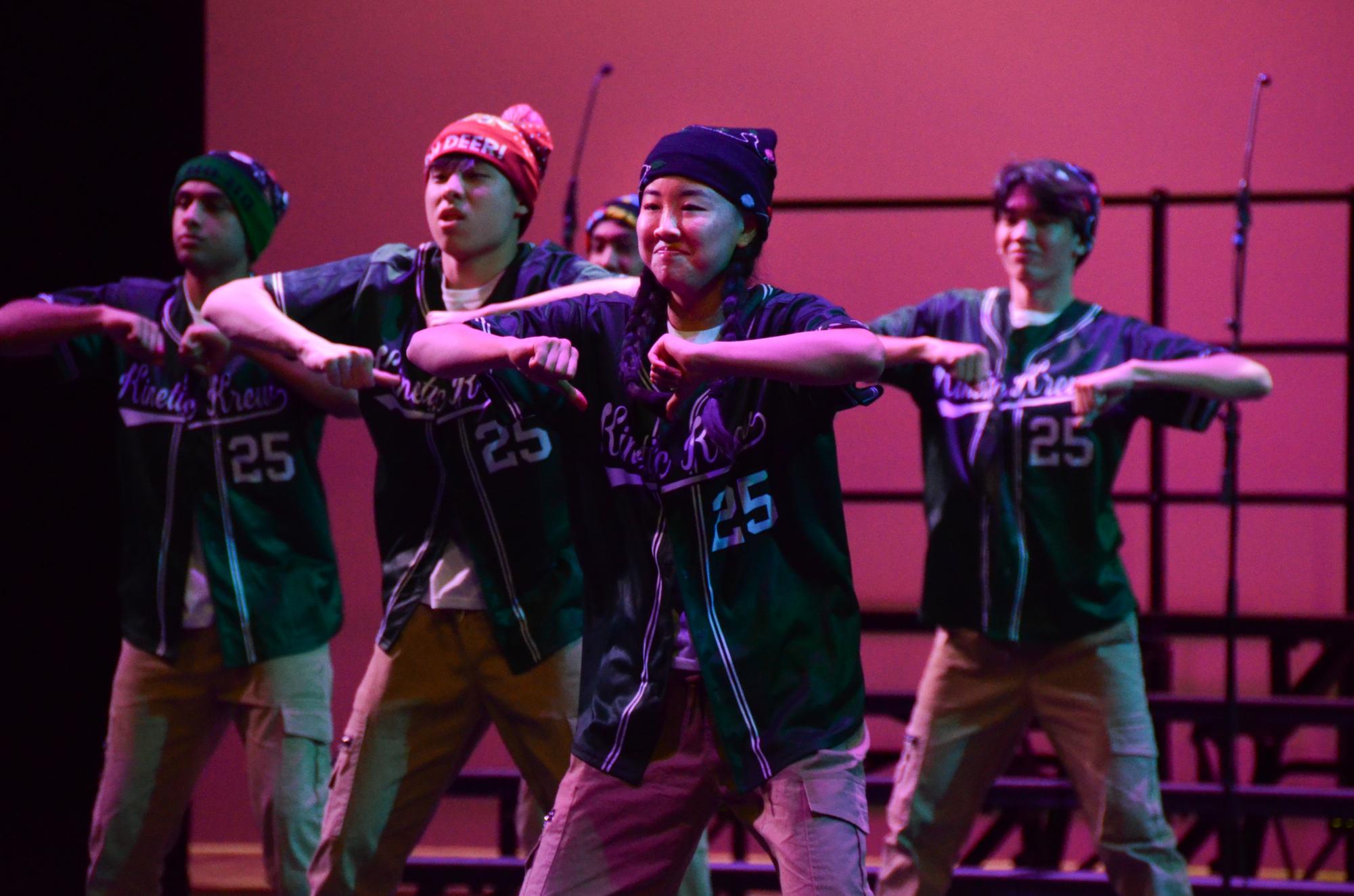 Kinetic Krew member Claire Cheng (12) dances to “Man’s Not Hot: Christmas Edition.” Kinetic Krew learned the routine over the summer at training camp.