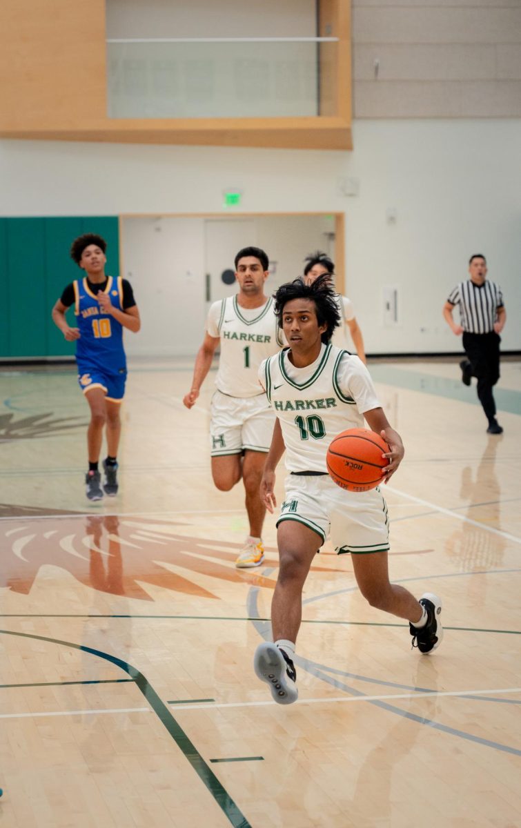 Guard Rishaan Thoppay (11) prepares for a layup on a fast break. Harker had 16 steals against the Bruins, which they efficiently converted to baskets.