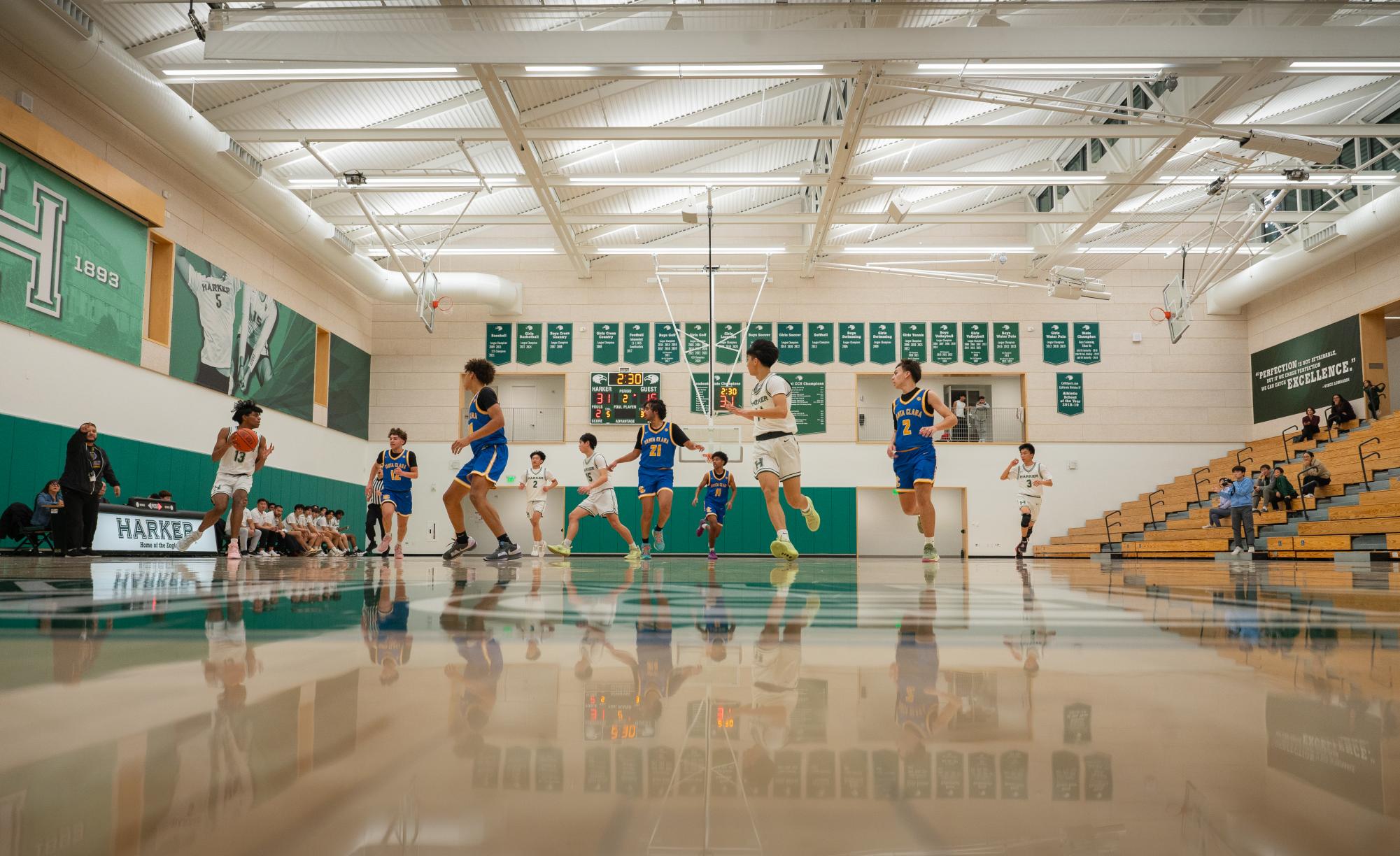 Bruins and Eagles alike look towards forward Rohit Yalla (12) as he dribbles the ball up the court. Rohit scored 16 points shooting 73% from the field.