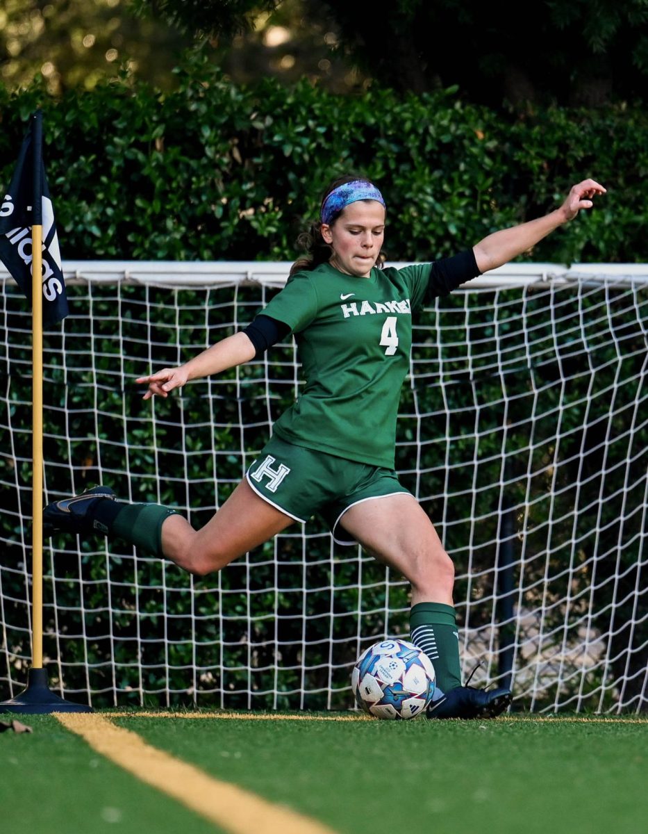 Claire swings a cross into the 18-yard box off of a corner kick. When it comes to set pieces and key plays, captains often step up to finish the opportunity.