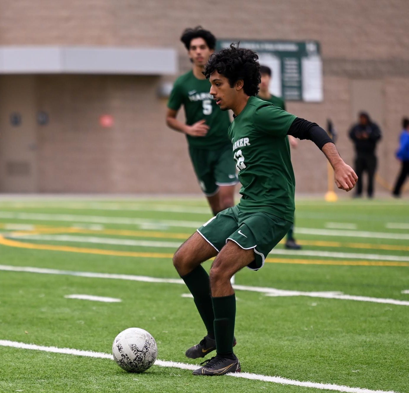 Veer prepares to clear the soccer ball out of the Eagles' defensive third. Harker's defense remained organized despite Pinewood's quick transitions.