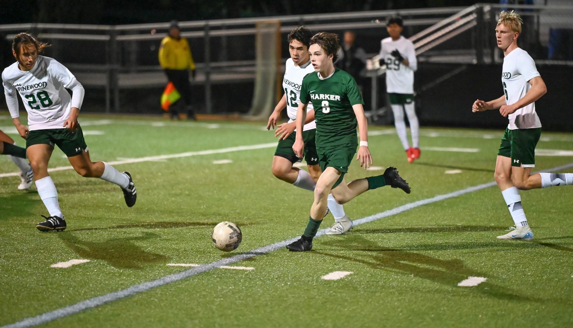 Midfielder Ryder Hewitt (11) weaves the ball through defenders. Despite creating multiple opportunities in both halves, the Eagles were unable to score many of their chances.