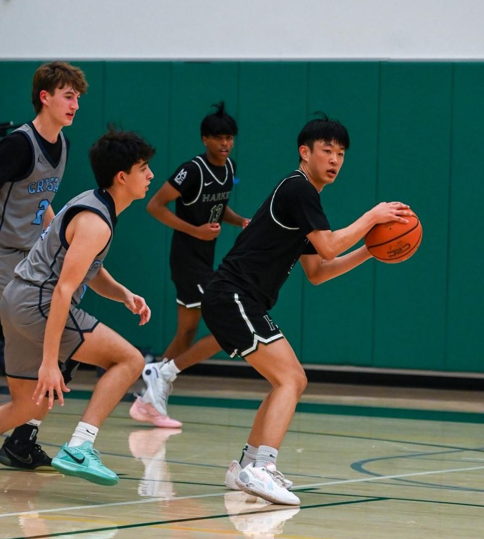 Co-captain and point guard Bowen looks to make a pass. Bowen sunk the last basket of the first quarter. 