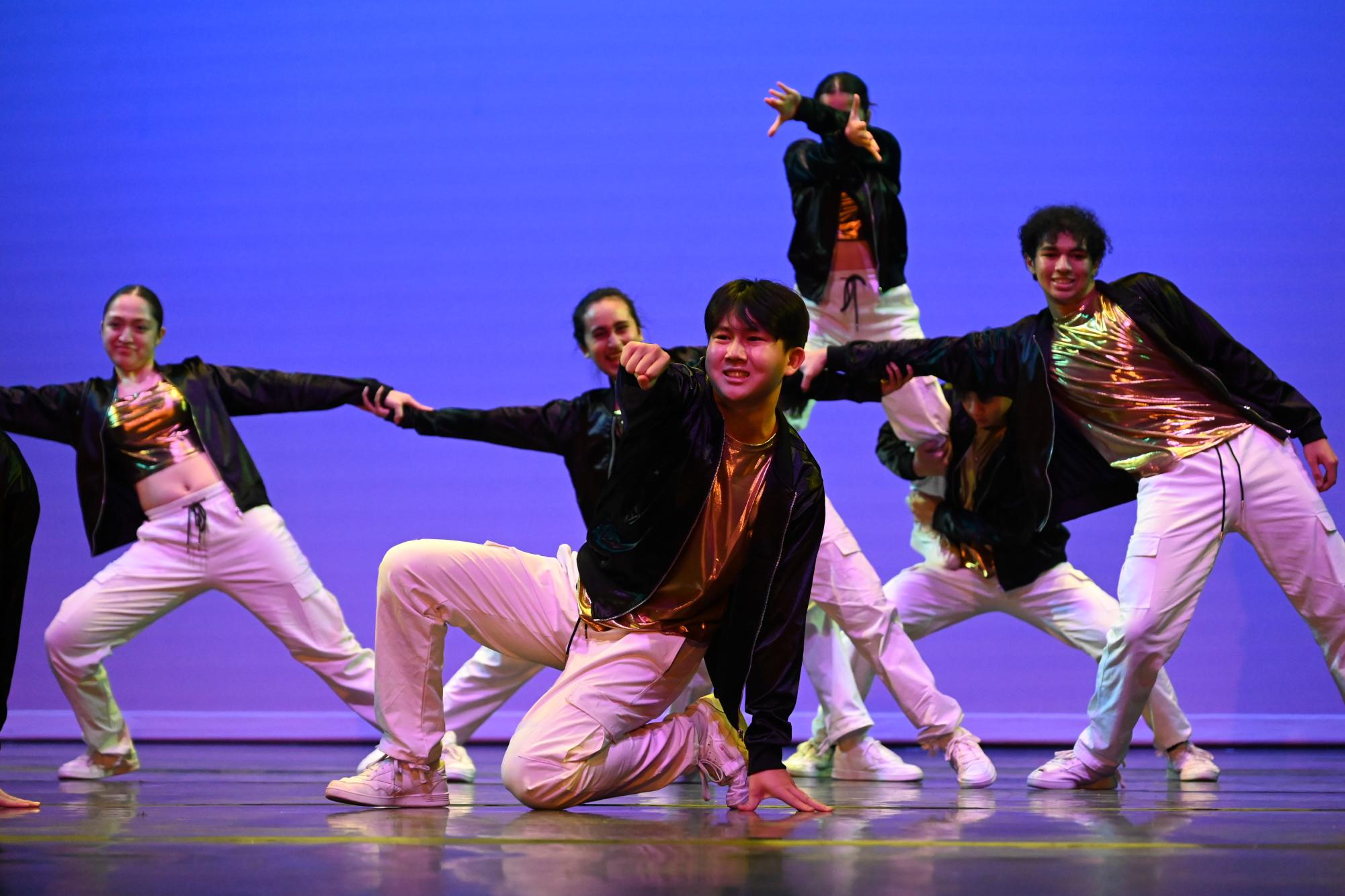 Senior Aaron Bao strikes a pose in "I Like It." Kinetic Krew captain Arthur Wu (12) choreographed the dance.