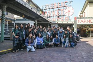 Harker Journalism staff poses in front of Pike Place in Seattle. Journalism students and advisers visited the city for the annual JEA/NSPA convention.