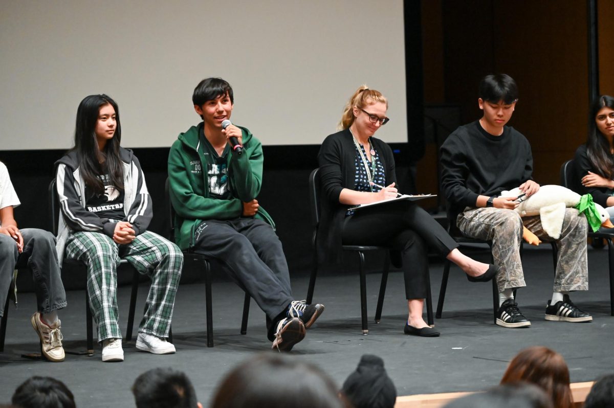Junior Brady Tse speaks during the class council candidates' panel session in the Rothschild Performing Arts Center. Juniors voted Brady, Janam Chahal and Claire Yu as their SAB representatives for the 2025-26 school year.