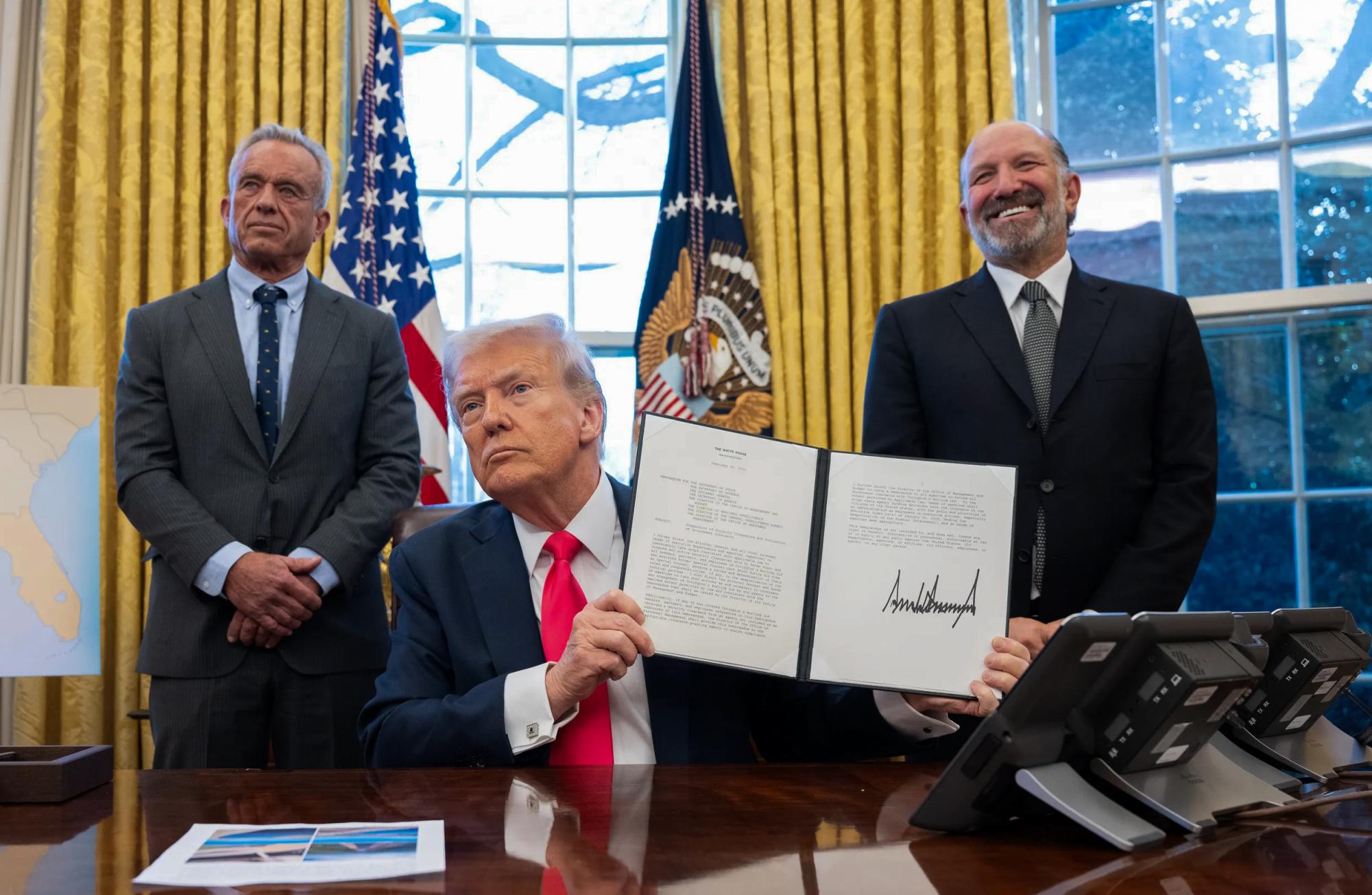 President Donald Trump signs executive orders orders in the Oval Office on February 25. That order suggested the Department of Commerce to impose 25% tariffs on copper.