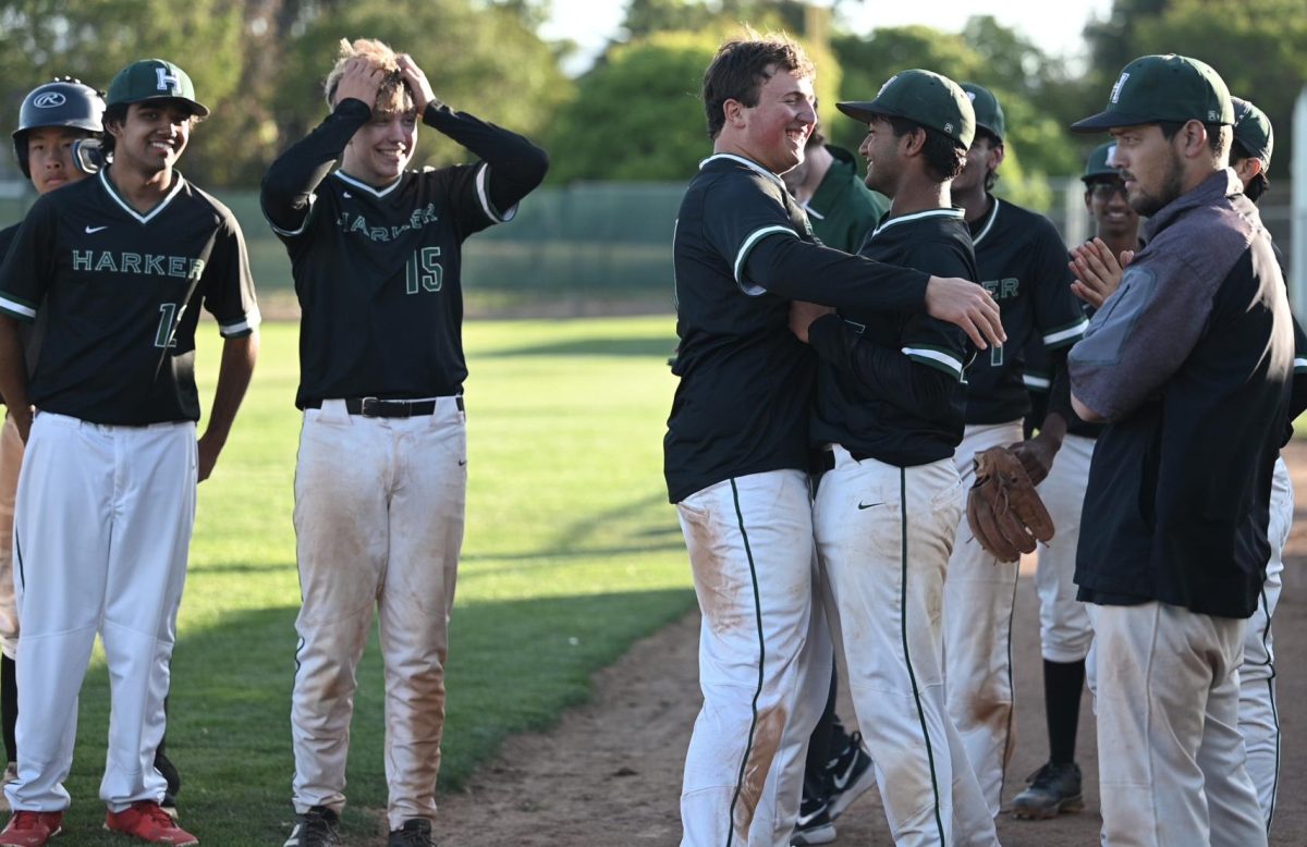 Senior Gabe Sachse and sophomore Shaurya Jain hug after winning the game. “I don’t want to say goodbye because [the seniors] are my friends outside of baseball as well,” Shaurya said. “Either way, I wanted to go all out for the seniors.”