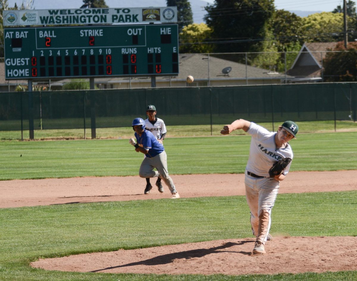Sophmore Mason Brooks throws the ball as Jefferson attempts to steal a base. Mason's pitching, boasting nine strikeouts, contributed to the flawless defense from Harker.