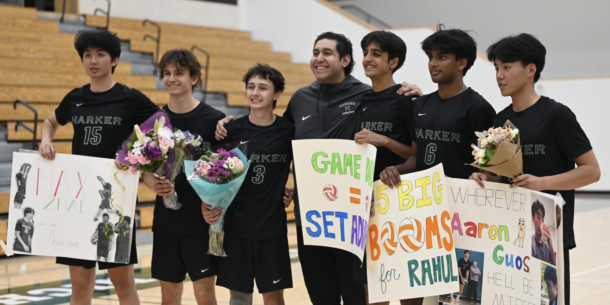 Seniors on the varsity boys volleyball team pose with head coach Mason Tufuga. The team celebrated the seniors in a ceremony before the game.