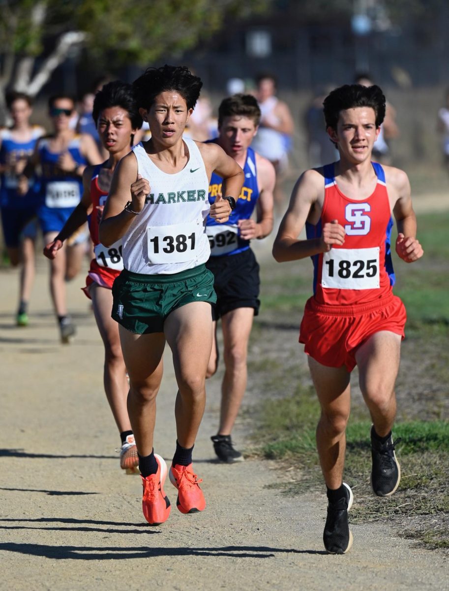 Senior Robinson Xiang competes in a varsity cross country race. For many runners, long-distance events provide an opportunity for both mental and physical growth.