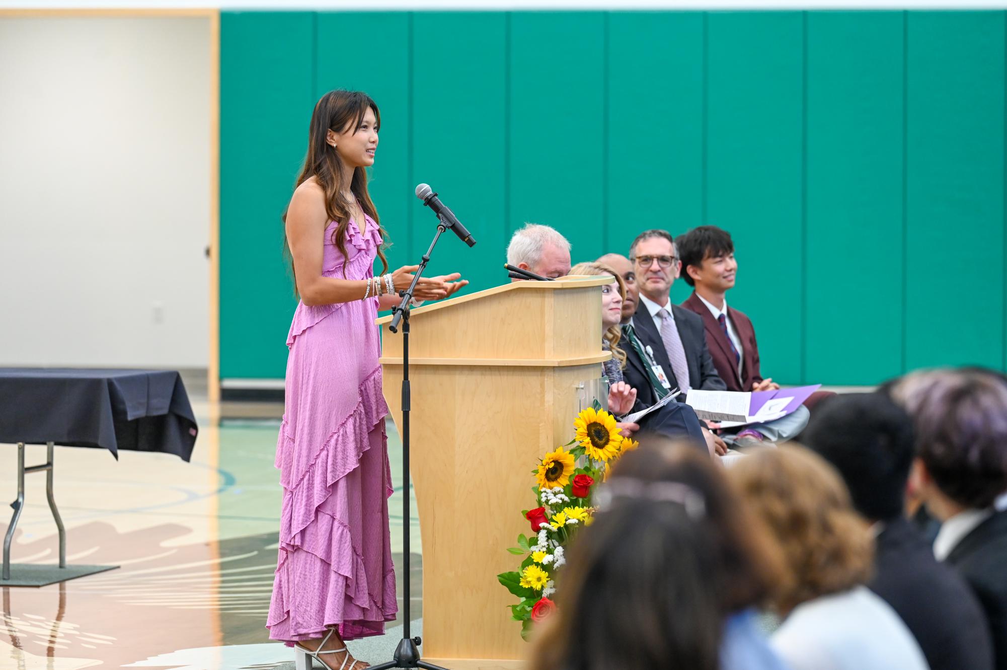 Honor Council member Linda Zeng speaks about the value of integrity through relating a childhood anecdote about stealing a classmate's possession. Various student leaders gave speeches highlighting personal accountability, respect, integrity and kindness.