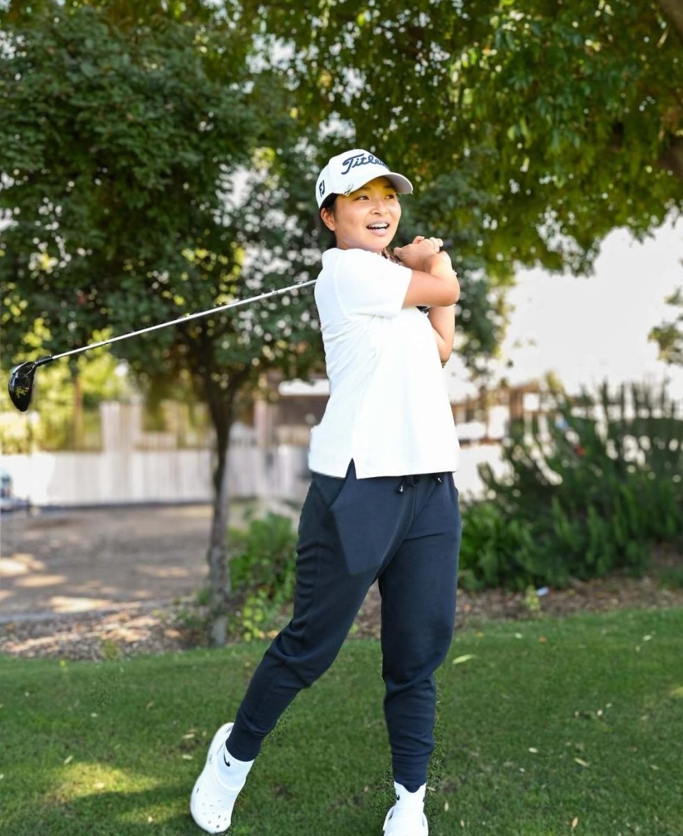 Sai Kaneshiro (10) warms up her swinging technique during a practice. “I try to not think about [the pressure] too much and just take it one day at a time, one tournament at a time,” Sai said.