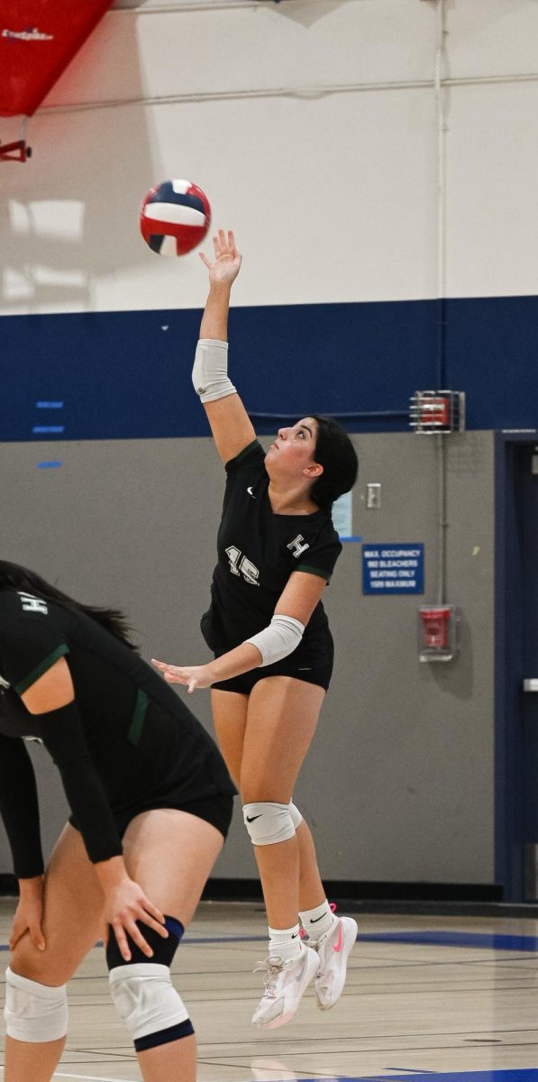 Lily Ahluwalia (10) jumps up to serve her second service ace in a row. Although the Eagles were neck and neck with Branham in the beginning of the second set, Lily’s series of aces brought Harker up to a 13-6 lead. One final ace from Lily closed the game with Harker’s victory.