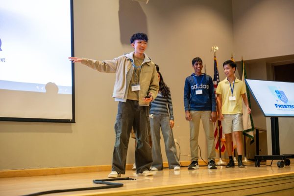 Frosh Joshua Woon presents his team’s business pitch at the Innovation Challenge, where parents, students and judges attended. His team, which proposed a special ice cube designed to prevent drink spiking, received the “Best Overall” award.