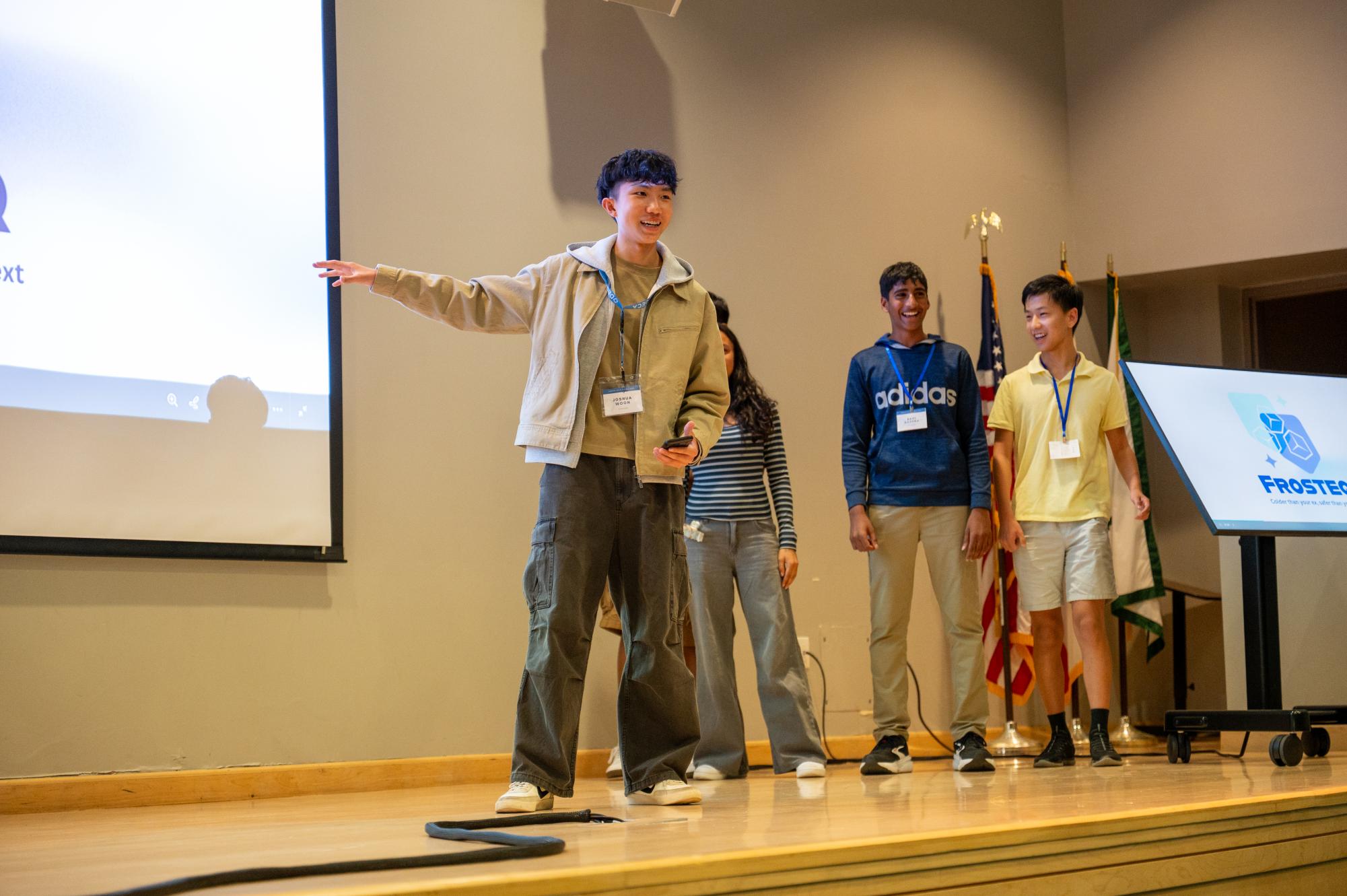 Frosh Joshua Woon presents his team’s business pitch at the Innovation Challenge, where parents, students and judges attended. His team, which proposed a special ice cube designed to prevent drink spiking, received the “Best Overall” award.