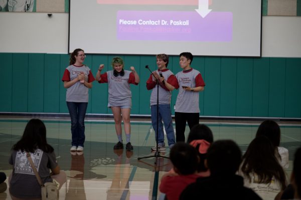Theater department members Taylor, Daniel Miao (12) and Holly Templeton (12) announce the Oregon Shakespeare Festival trip to Ashland, Oregon. Attendees will participate in workshops and see four plays: “The Merry Wives of Windsor,” “The Importance of Being Earnest,” “Into the Woods” and “As You Like It.”