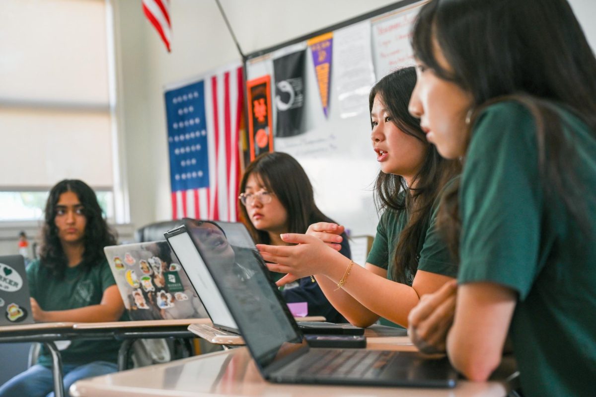 Winged Post EIC Tiffany Zhu (12) answers questions attendees had about adapting Harker Journalism's systems to their own publications. “It was really just amazing to see that community and see how everyone was helping each other out, and we were all learning from each other."