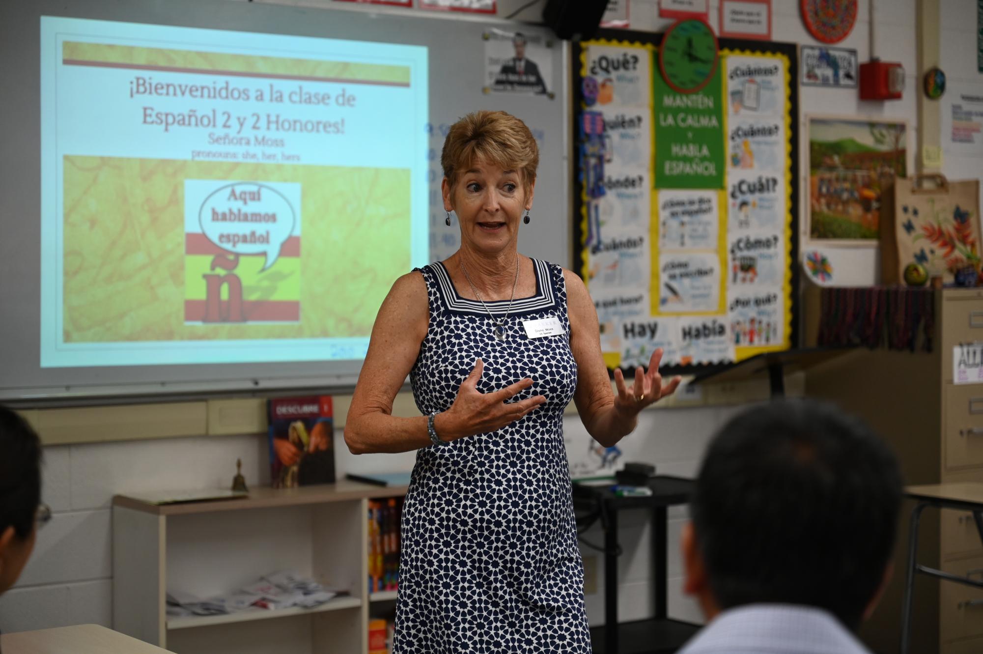 Spanish teacher Diana Moss talks to parents. She gave the parents an overview of the course and what they could expect.