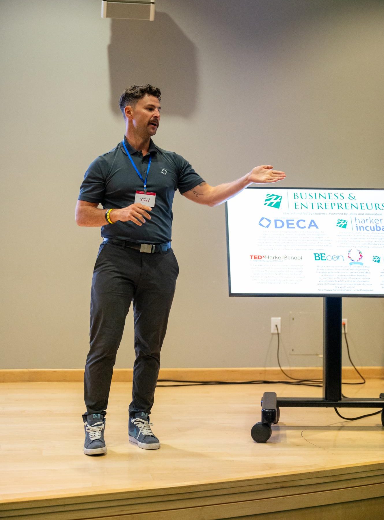 Glass presents information regarding Harker's Business and Entrepreneurship program. Glass also introduced clubs like BEcon, TEDx and Investing Club.
