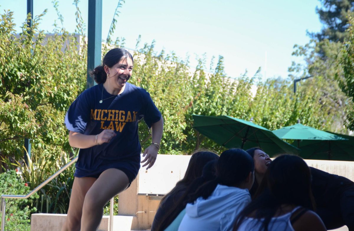 Lily Ahluwalia (10) runs around the circle as the "goose." "I think it’s good to take breaks and take time to have fun, instead of just going to lunch and studying."