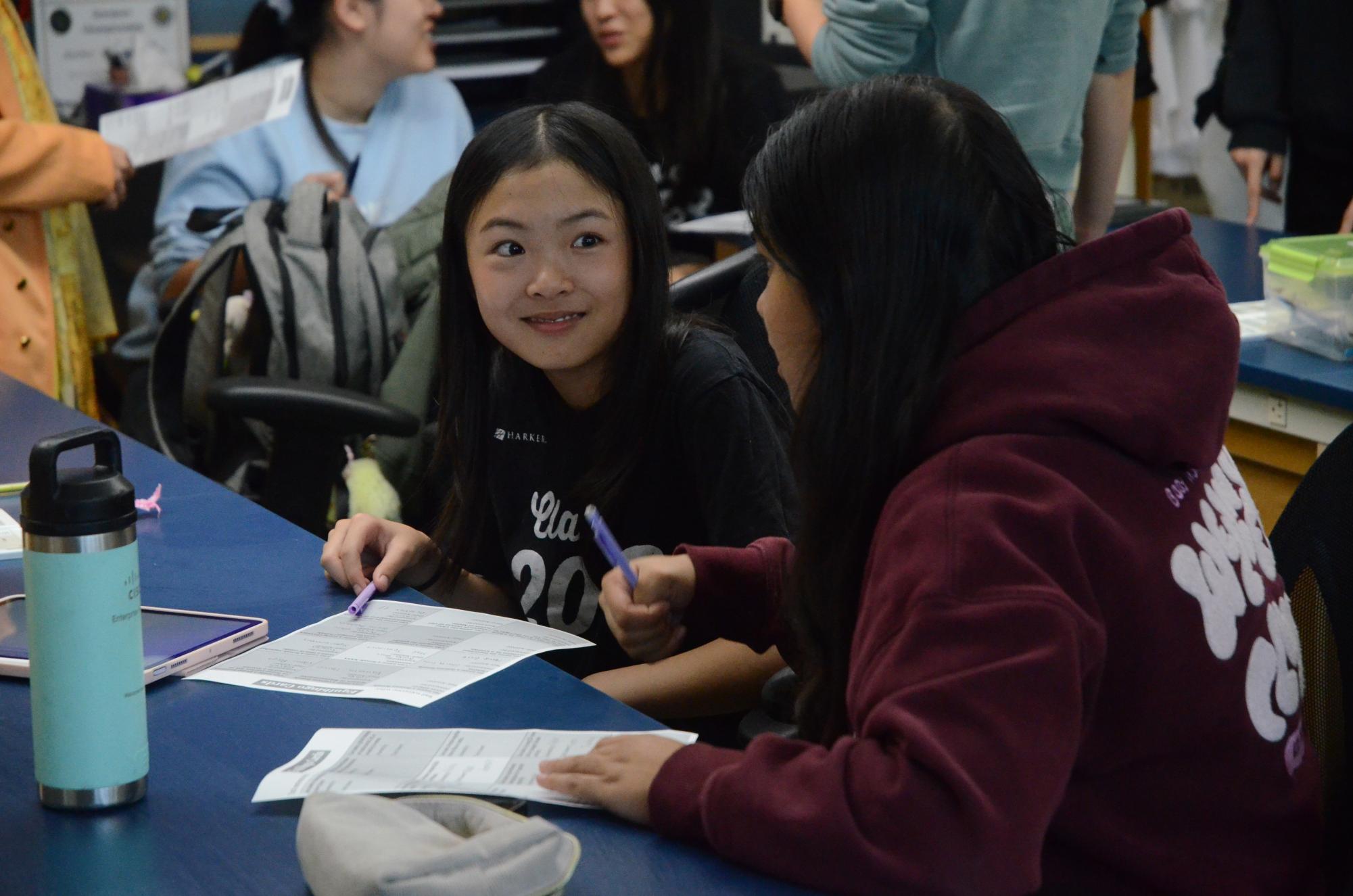 Sophomores Saria Lum and Liana Barooah participate in the WiSTEM bingo game. WiSTEM hosted a meeting to commemorate the International Day of the Girl, a global day recognizing girls’ rights and the challenges they have and continue to face.