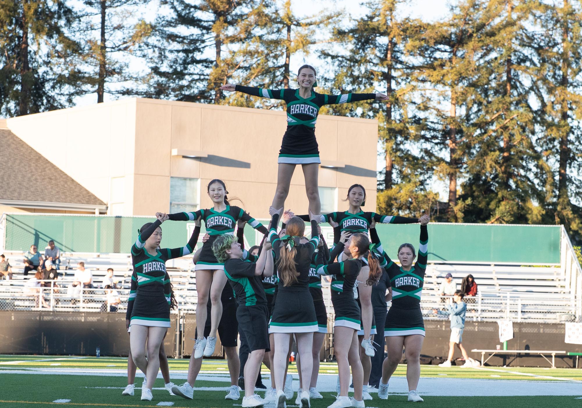 Varsity cheer performs a routine before the match. The team recognized seniors Christy Ma, Sophia Bagley, Taylor Summers, Ollie Masoni and Sofia Vasquez-Perez.