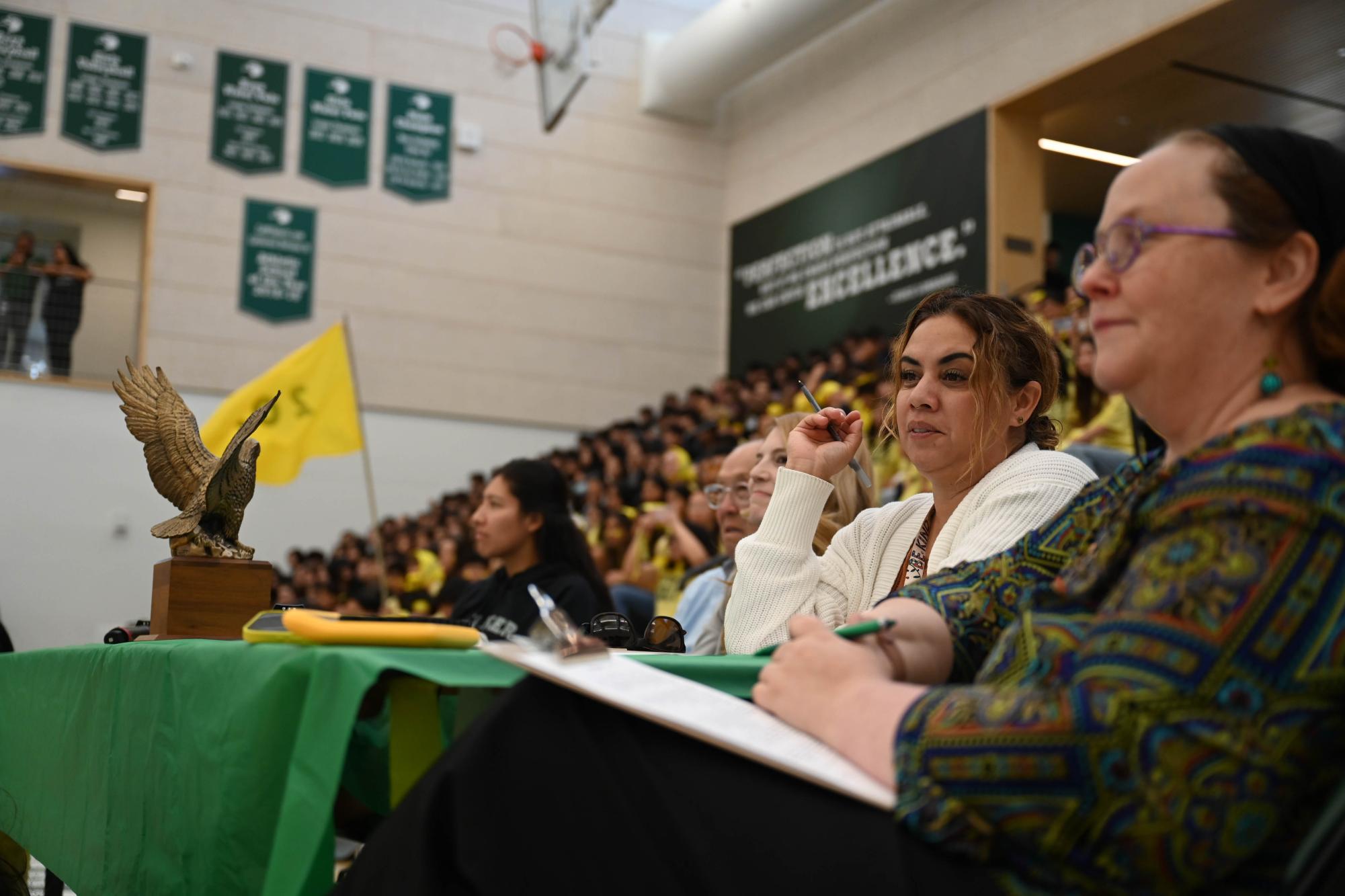 Assistant Counselar Paulina Reynoso watches the senior lip synch. Each routine was scored by a panel of five faculty judges.