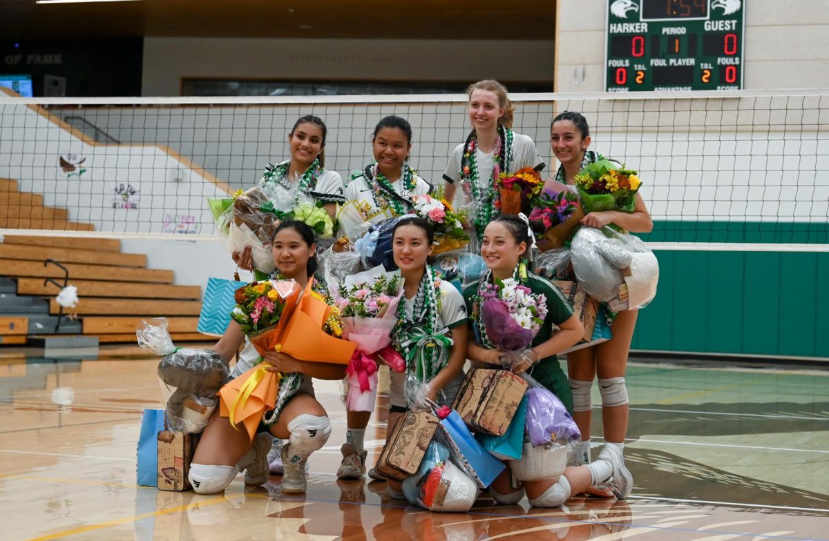 Seniors Aline Grinspan, Keira Chang, Nat Tan, Elie Ahluwalia, Eden Kelly, Brooke Kubose and Ruhi Banerjee pose for a photo during the Senior Night ceremony. Each player recieved a gift bag, flowers and a lei.