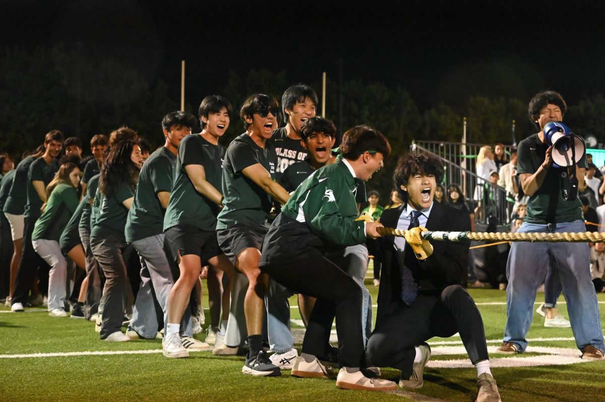 Spencer Chang (12) spearheads the senior tug-of-war team. The seniors triumphed over the sophomores in 44 seconds. 