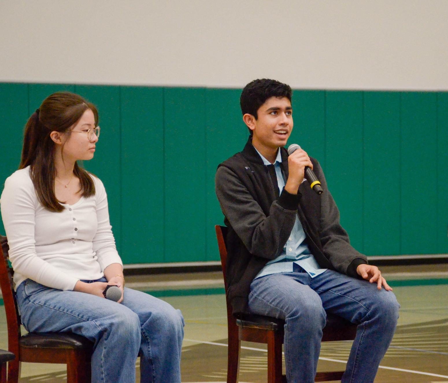Senior Ishan Mysore answers a question during the student panel. Upper School division head Paul Barsky asked the panelists several questions about academics and student life.