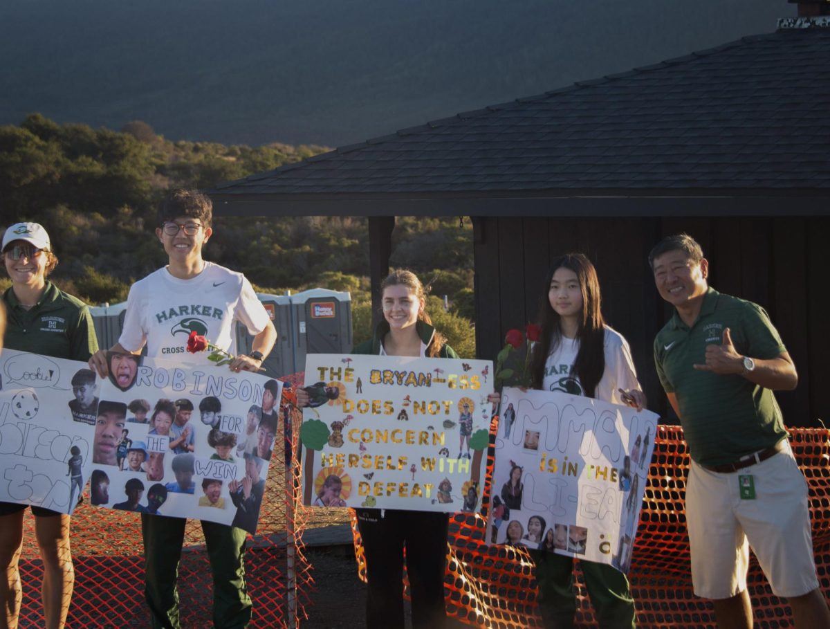 Seniors Robinson Xiang, Emily Bryan and Emma Li pose with their personalized posters and roses with coach Jorge Chen. Seniors were honored in a senior night ceremony at Crystal Springs with gifts and bouquets.