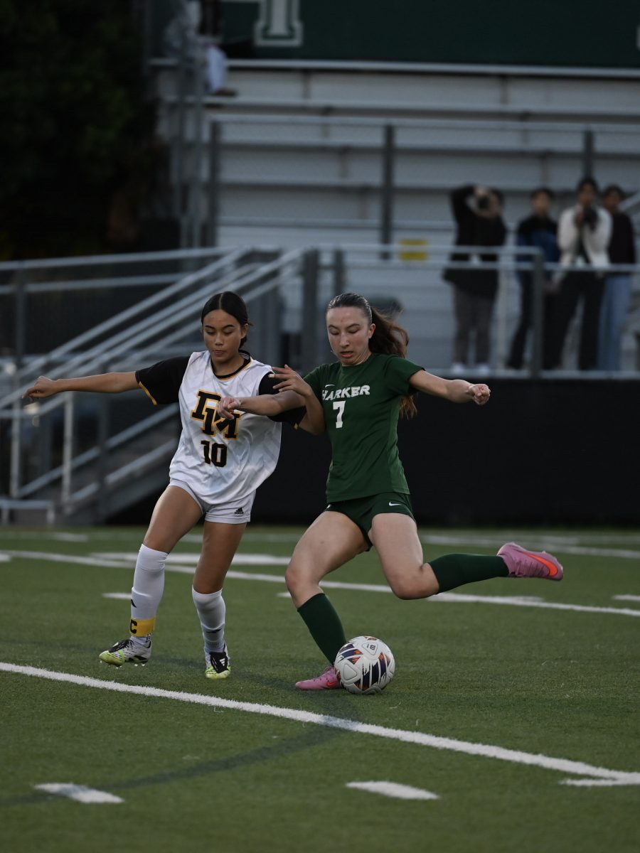 Defensive midfielder Kaitlyn Nelson (11) attempts to shoot the ball. Kaitlyn controlled the midfield throughout the game, intercepting Del Mar passes and driving the ball towards the goal.