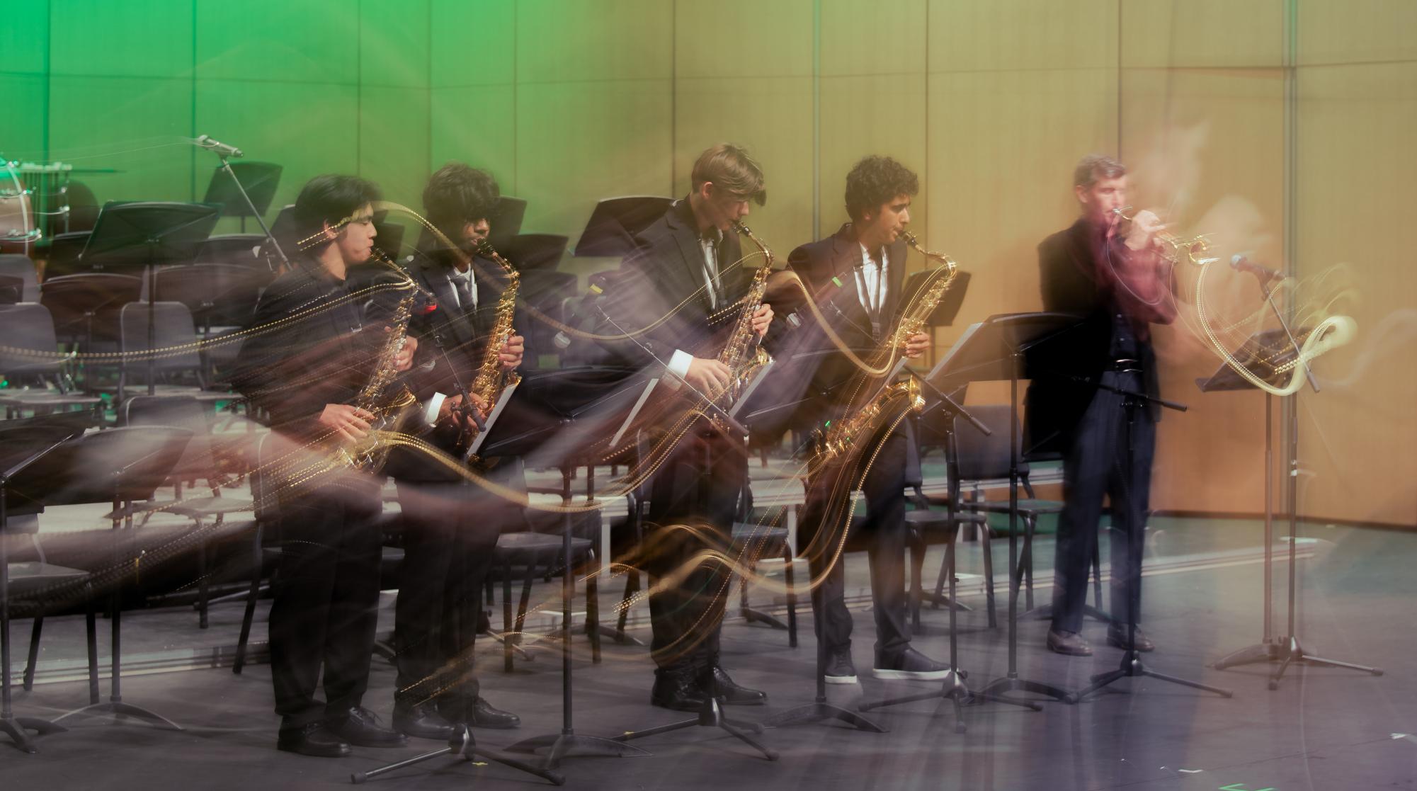 Lab Band members Matthew Gu (9), Aditya Gupta (9), Aydin Mesic (10) and Arjun Khara (9) play alongside their director David Hart. Lab Band focuses on developing musicians' improvisational skills.