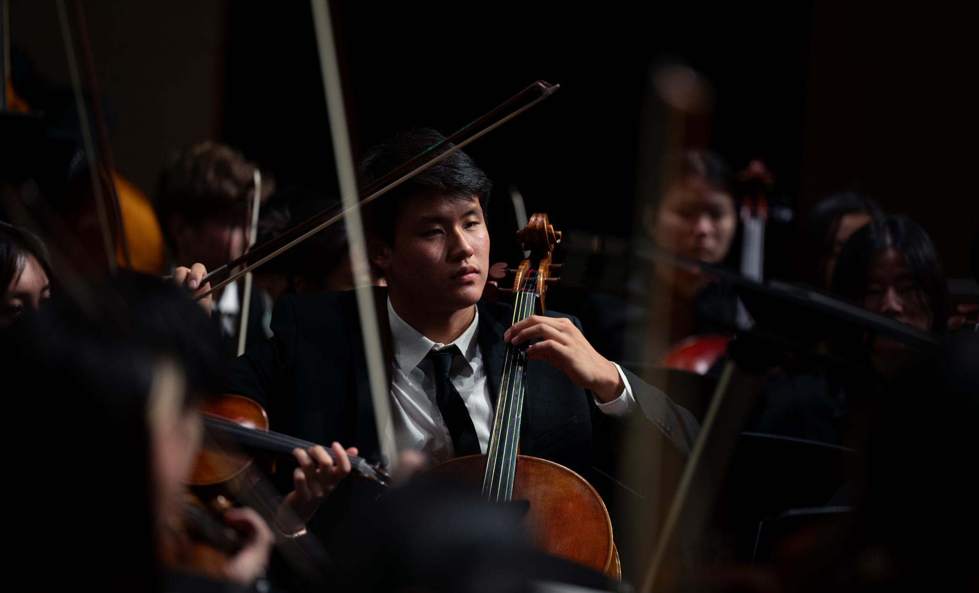 Principal cellist Haniel Baek (9) delivers a flourish to end Josef Strauss's Sphärenklänge Walzer (Music of the Spheres), Op.235. According to conductor Jaco Wong, Strauss attempted to encapsulate the movement of the heavenly bodies within the melodies of his piece.