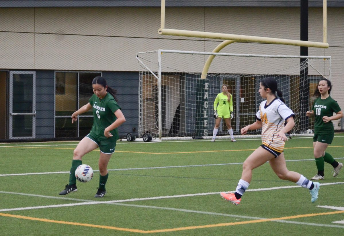 Right back Sophie Han (10) prepares to pass the ball to another Harker player. "We all worked together well and had good communication with each other," Sophie said.