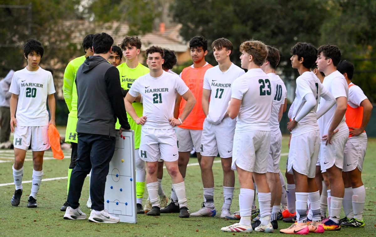 With the Eagles one goal up at halftime, head coach Seena Sajadieh speaks to Harker players about team tactics for the second half. Despite more Pinewood shots on goal compared to in the first half, the team maintained a clean sheet.