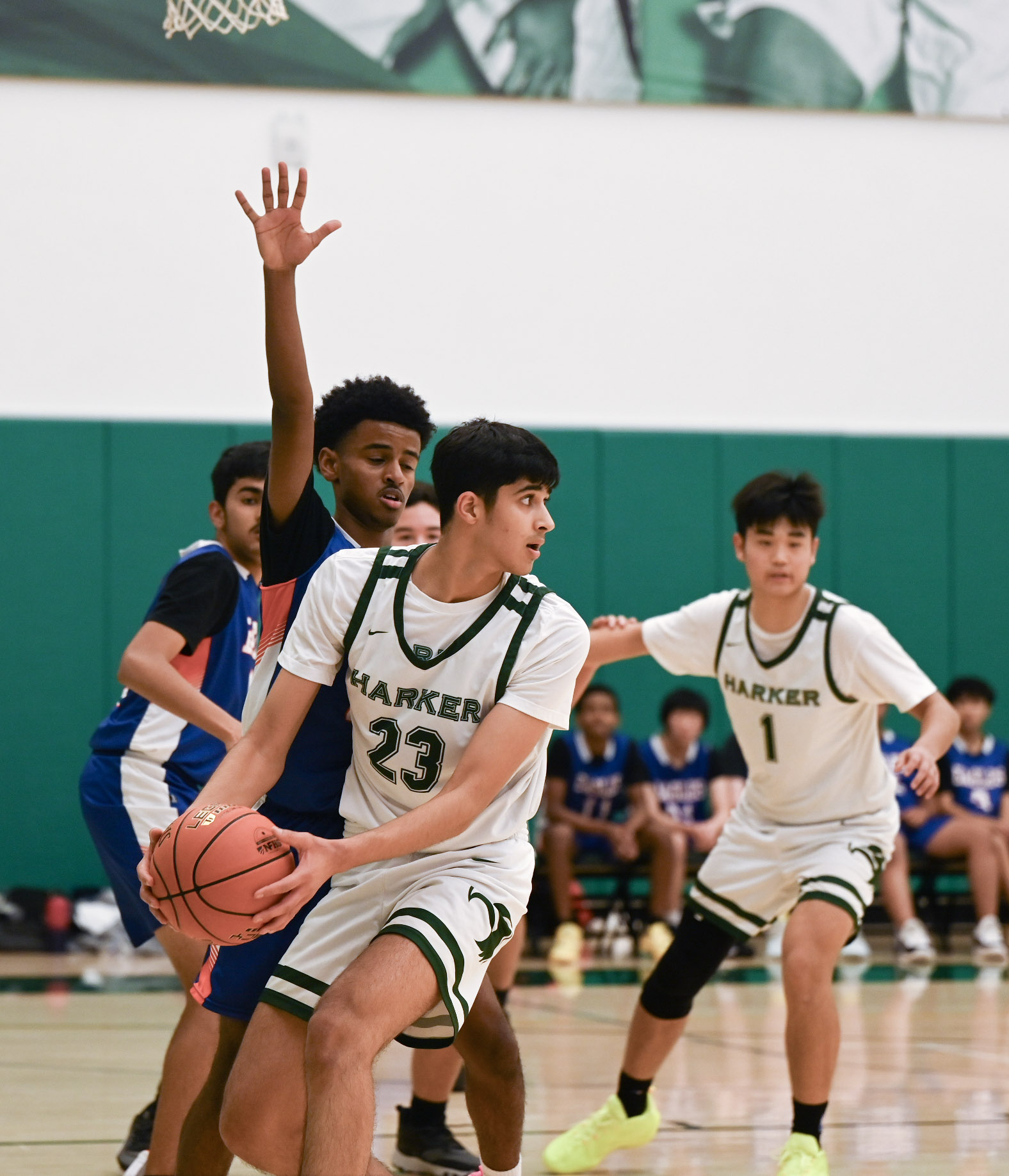 Center Rishik Sehgal (10) searches for an open look under the basket. As the primary rebounder, Rishik brought down several offensive rebounds and cashed in on second-chance points.