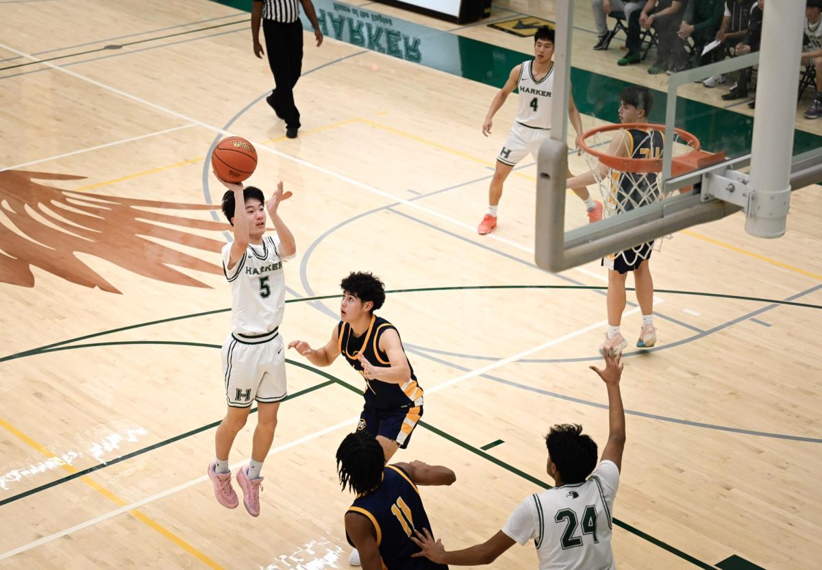 Point guard Stephen Gao (9) shoots from inside the paint after stepping past Menlo defenders. Stephen executed two assists, helping Harker narrow their deficit.