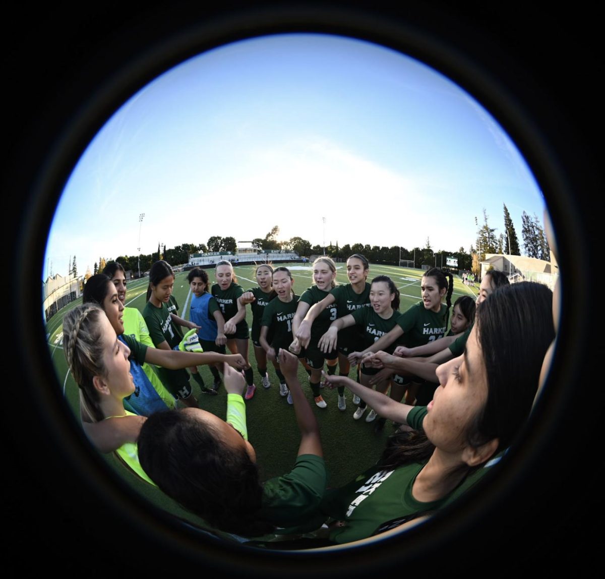 Varsity girls soccer team huddles before their season opener game against Del Mar. The team won the game 8-0.