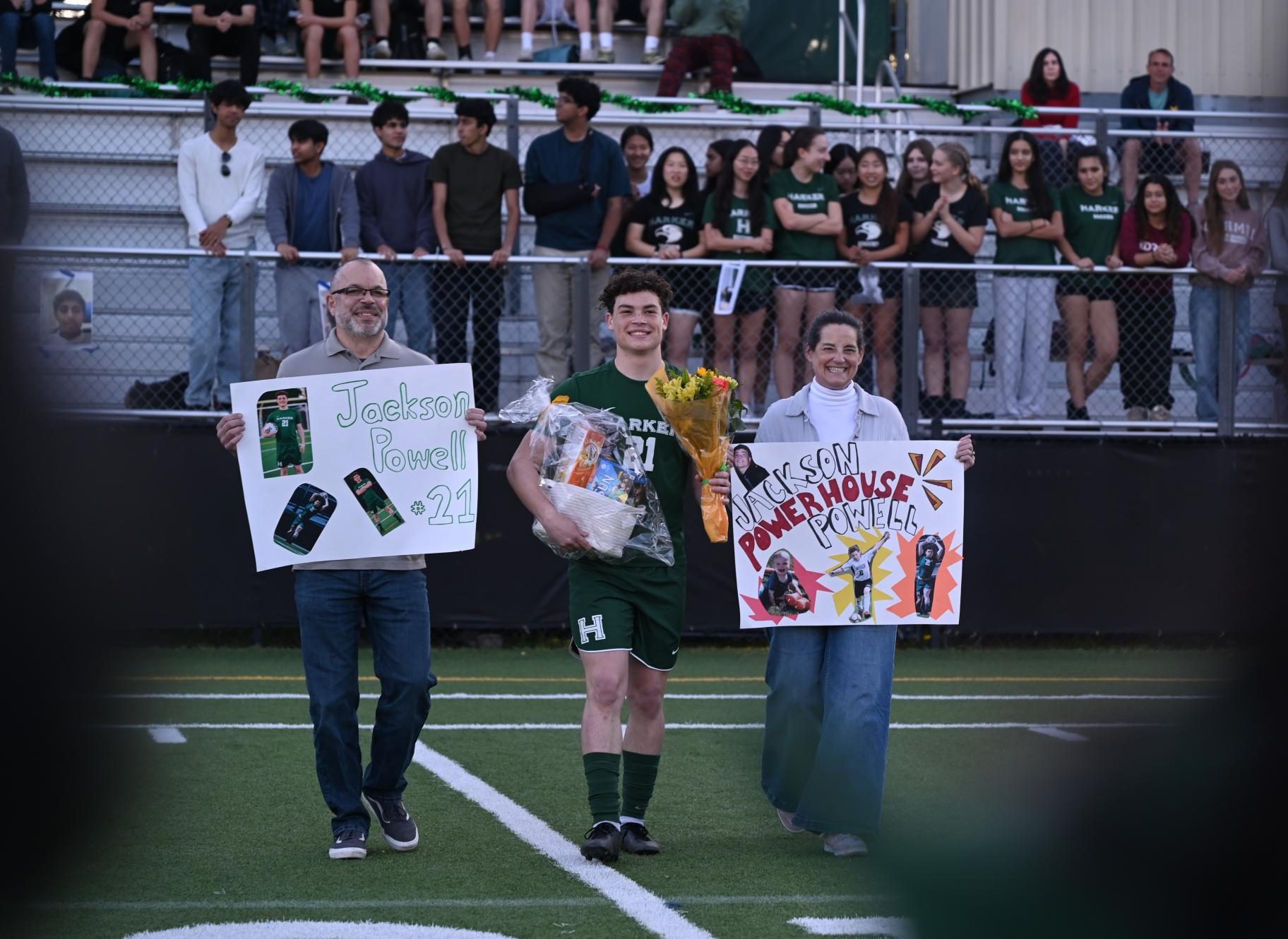 Center back Jackson Powell (12) smiles as he walks during the senior ceremony. “I’m grateful for everything I’ve been able to do for the team,” Jackson said. 