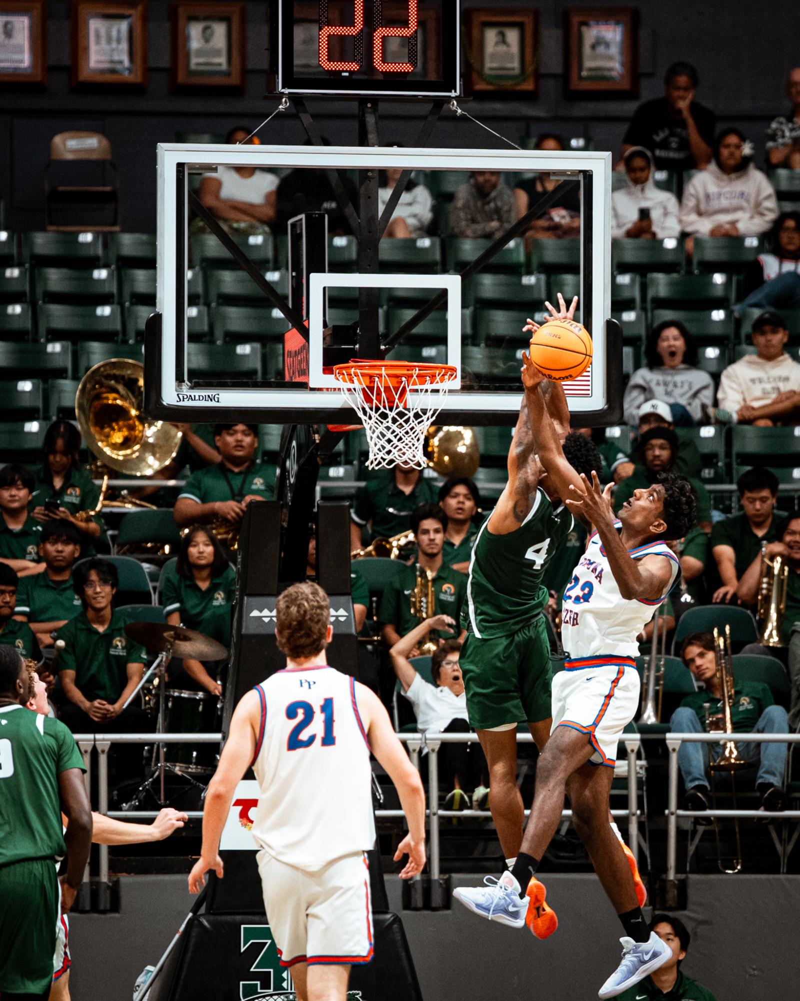 Pomona-Pitzer forward Abhi Namala goes up for a layup in game action, weaving through defenders with control. For him, success comes from discipline and mindfulness during every possession. (Provided by Abhi Namala)