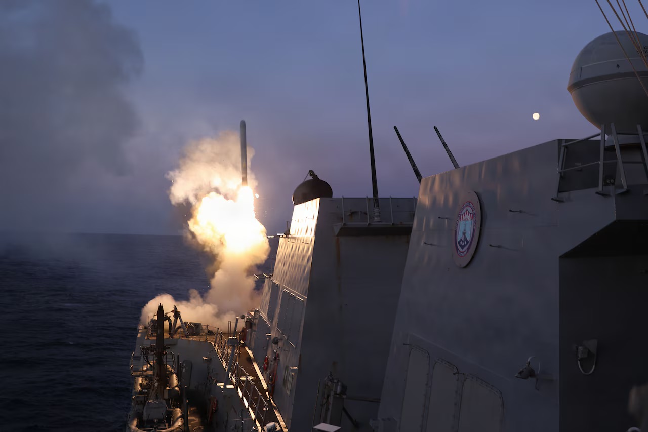 A U.S. warship launches a tomahawk missile in support of Operation Epic Fury, which aims to cripple Iran’s warhead production capabilities. Today marks the 27th day of the conflict pitting the U.S. and Israel against Iran. (Source: war.gov)