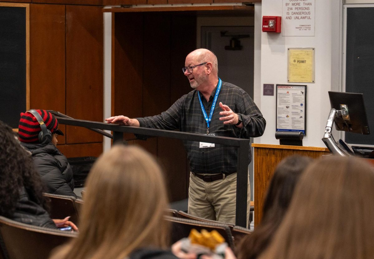 Association of Texas Photography Instructors Executive Director Mark Murray engages with the audience at the photography workshop. "We were trying to get photographers to not just settle for a standard type of photograph, but to try some new things," Murray said.
