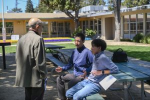 Justin Hu (10) and Cameron Rampell (11) answer audience questions about their thoughts on ICE and its recent acts of violence. They believed that right-wing political viewpoints were underrepresented, especially in the mostly liberal Bay Area.