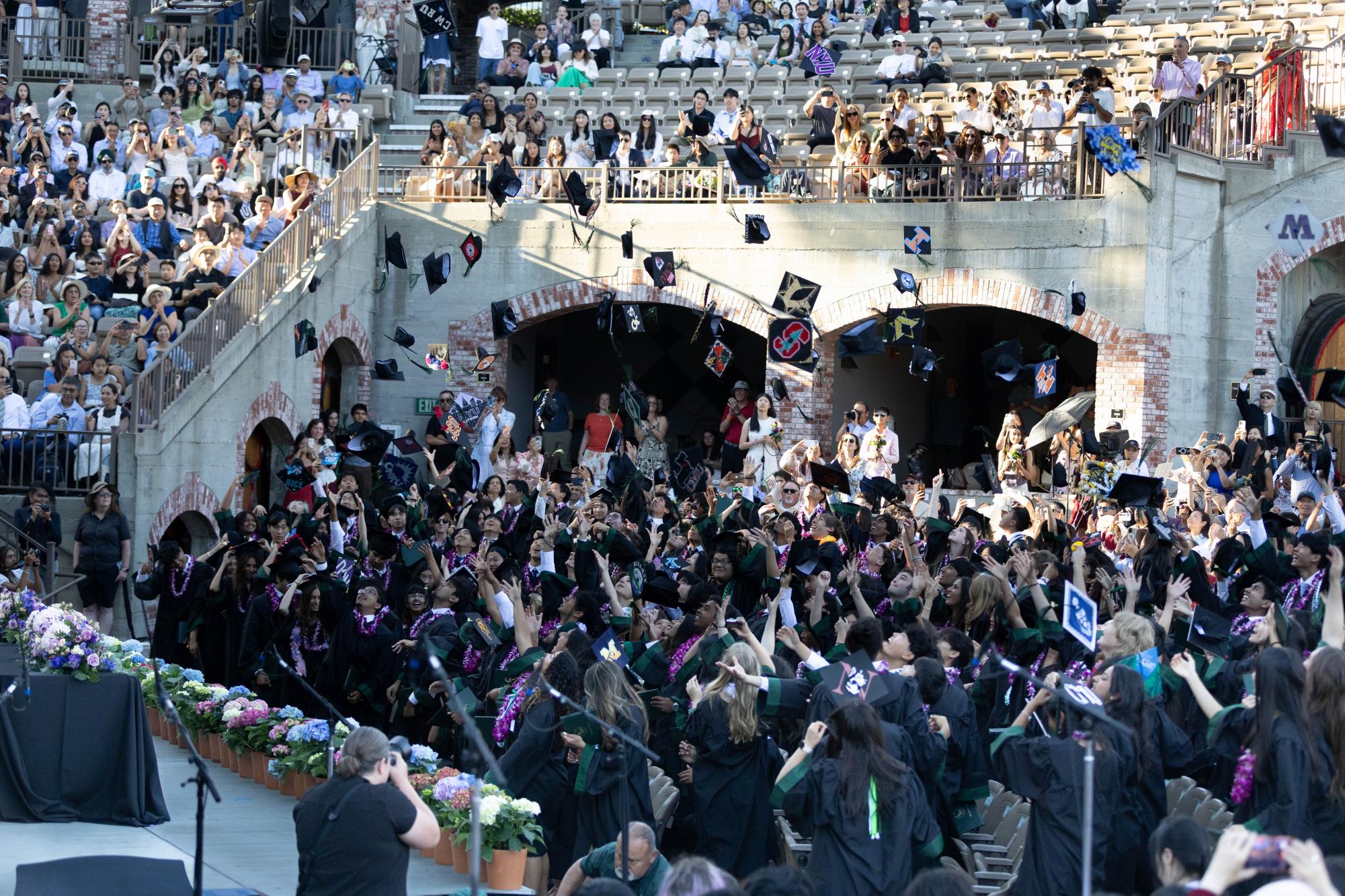 The class of 2026 tosses their mortarboards in the air to celebrate their accomplishment. It is an annual tradition for the graduating class to throw their caps in the air after everyone has received their diploma.