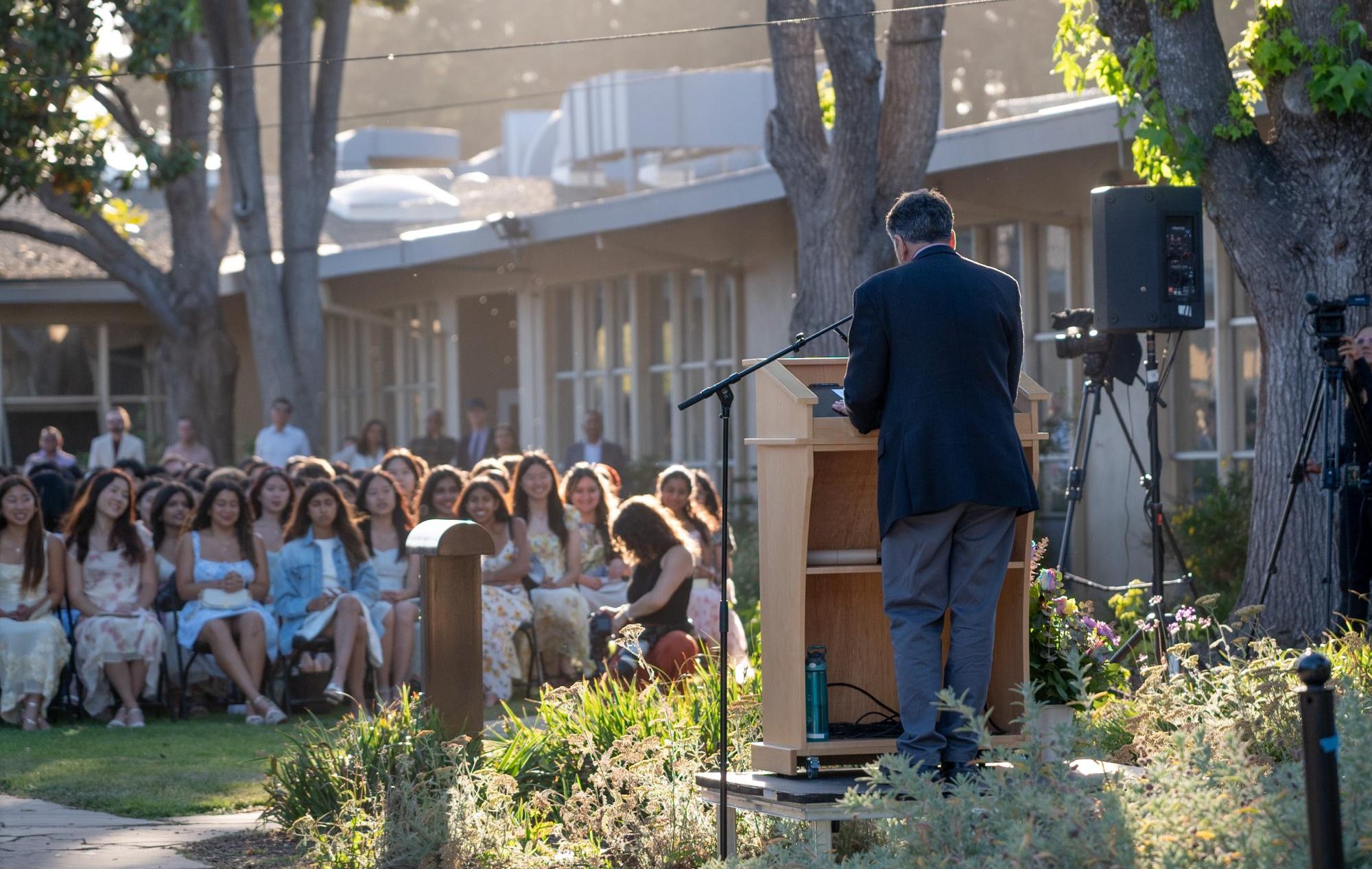 Math teacher Anthony Silk delivers his speech to upperclassmen. The senior class selected Silk as the faculty speaker for the ceremony.