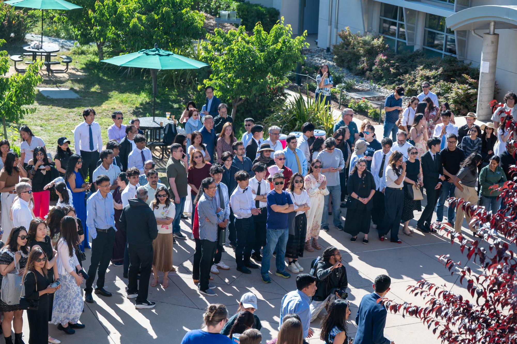 Seniors and their families gather in front of Dobbins to receive their brick. "You see kids when they come here and they're 14 and they haven't quite found themselves," head of Upper School Paul Barsky said. "If you're fortunate enough, you get to see how they evolve and maybe have a little small part of that mosaic of helping make a difference."
