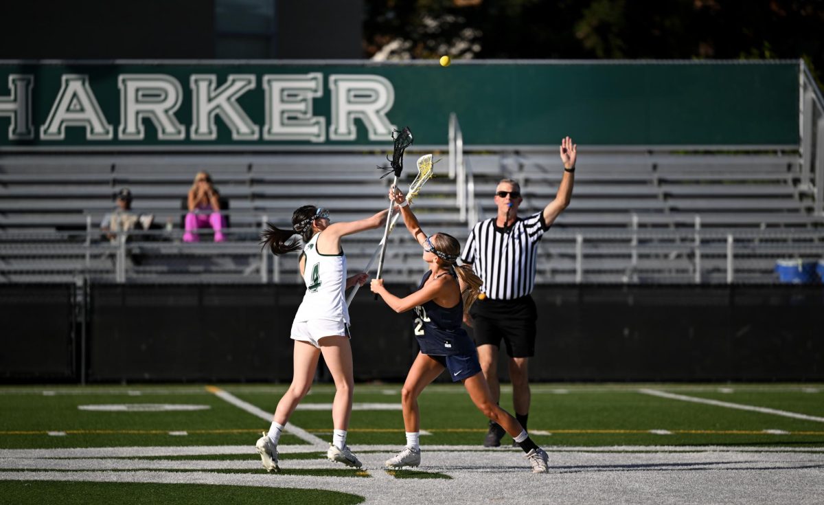 Senior captain Yena Yu fights for the initial draw. The Eagles started off strong, driving up the field multiple times.