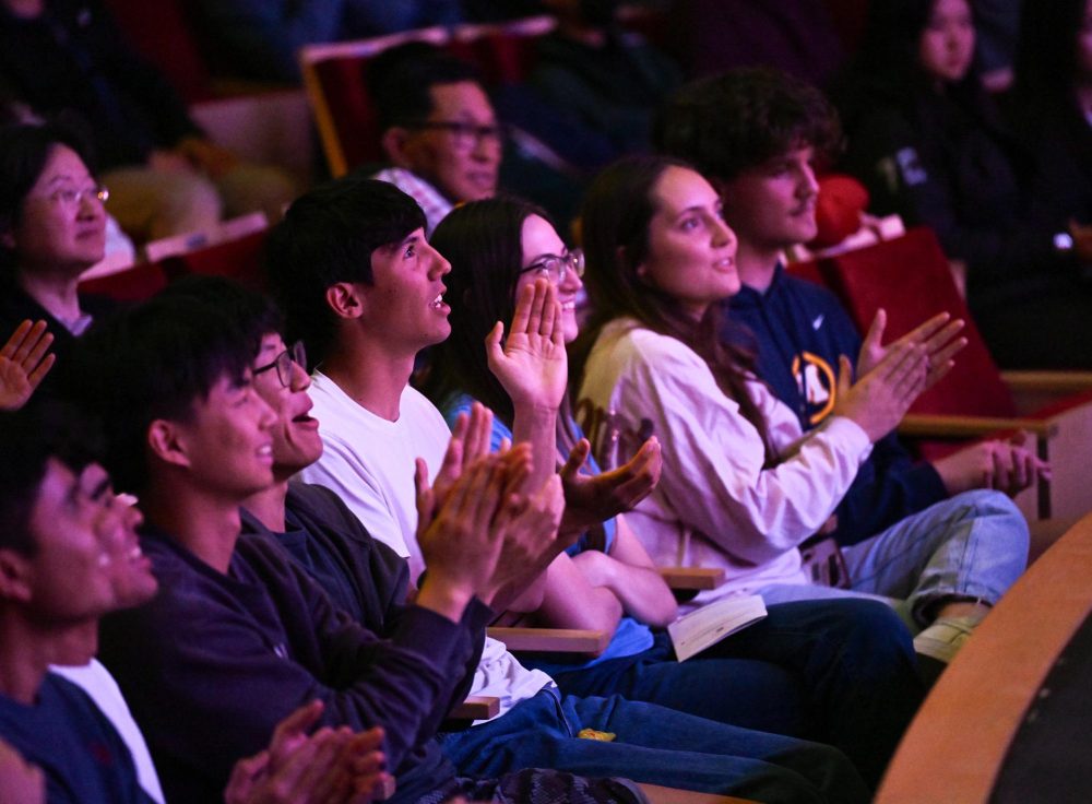 Seniors cheer on their friends in the audience. "It doesn't feel real that this is the last one and it’s senior year," Charlotte said.